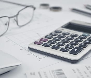 calculator, glasses, documents